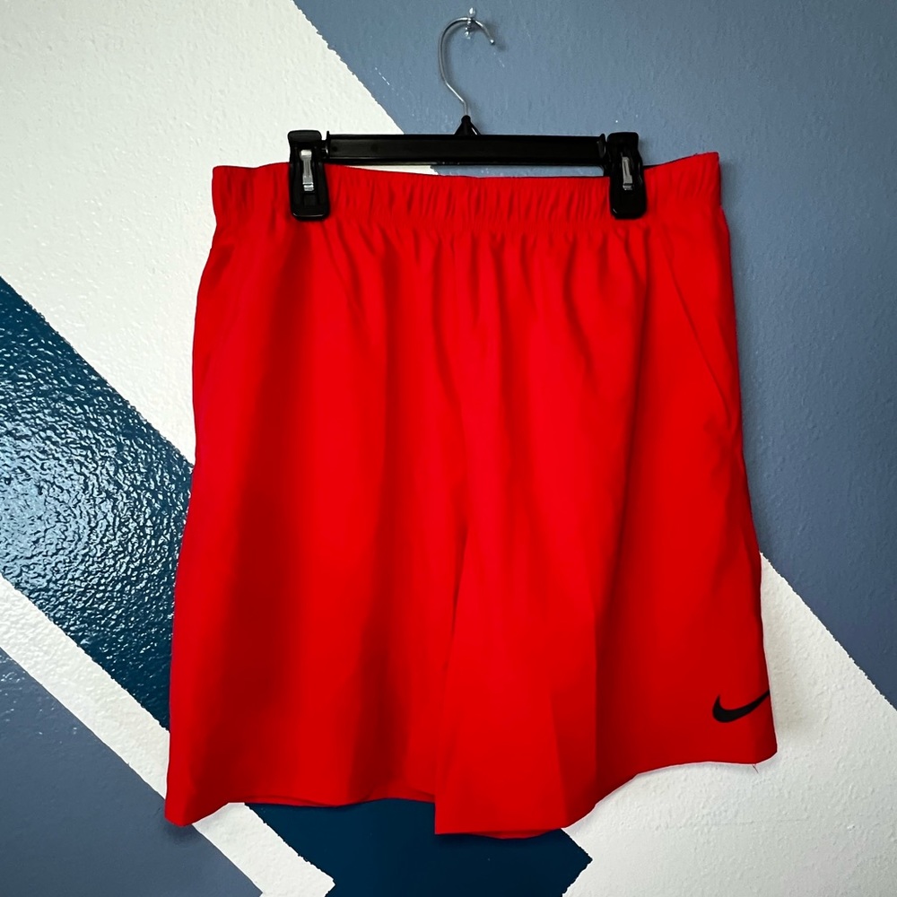 Red Nike shorts